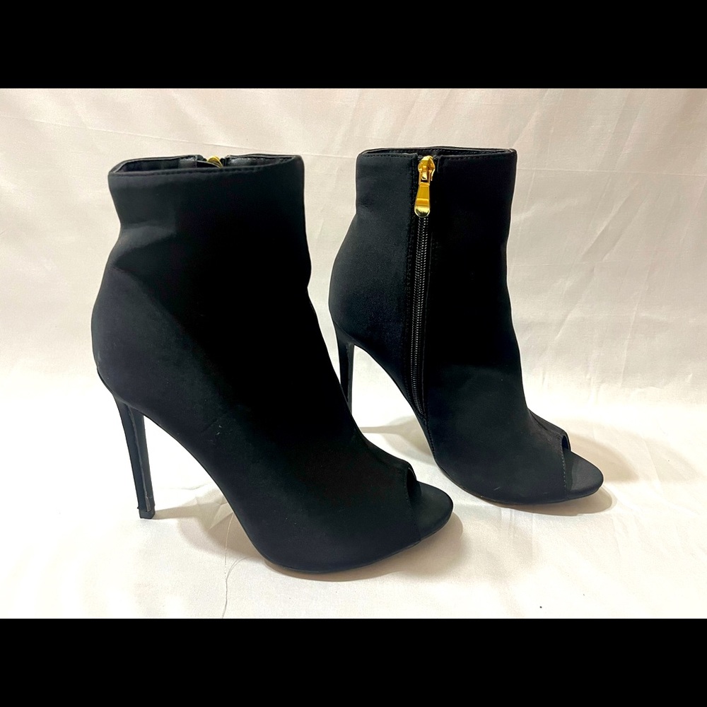 Black open toe booties in heels size 8